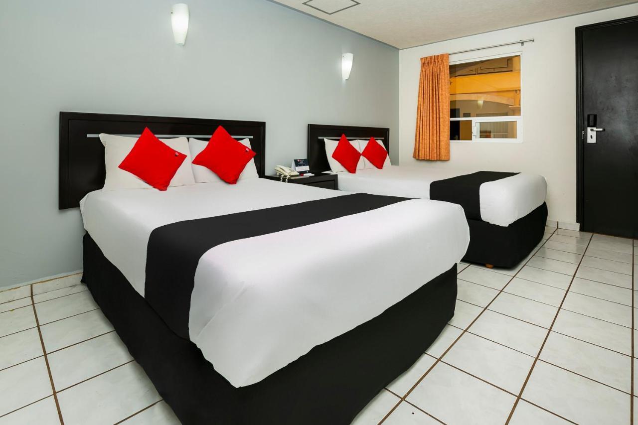 Capital O Hotel Victoria موروليا المظهر الخارجي الصورة