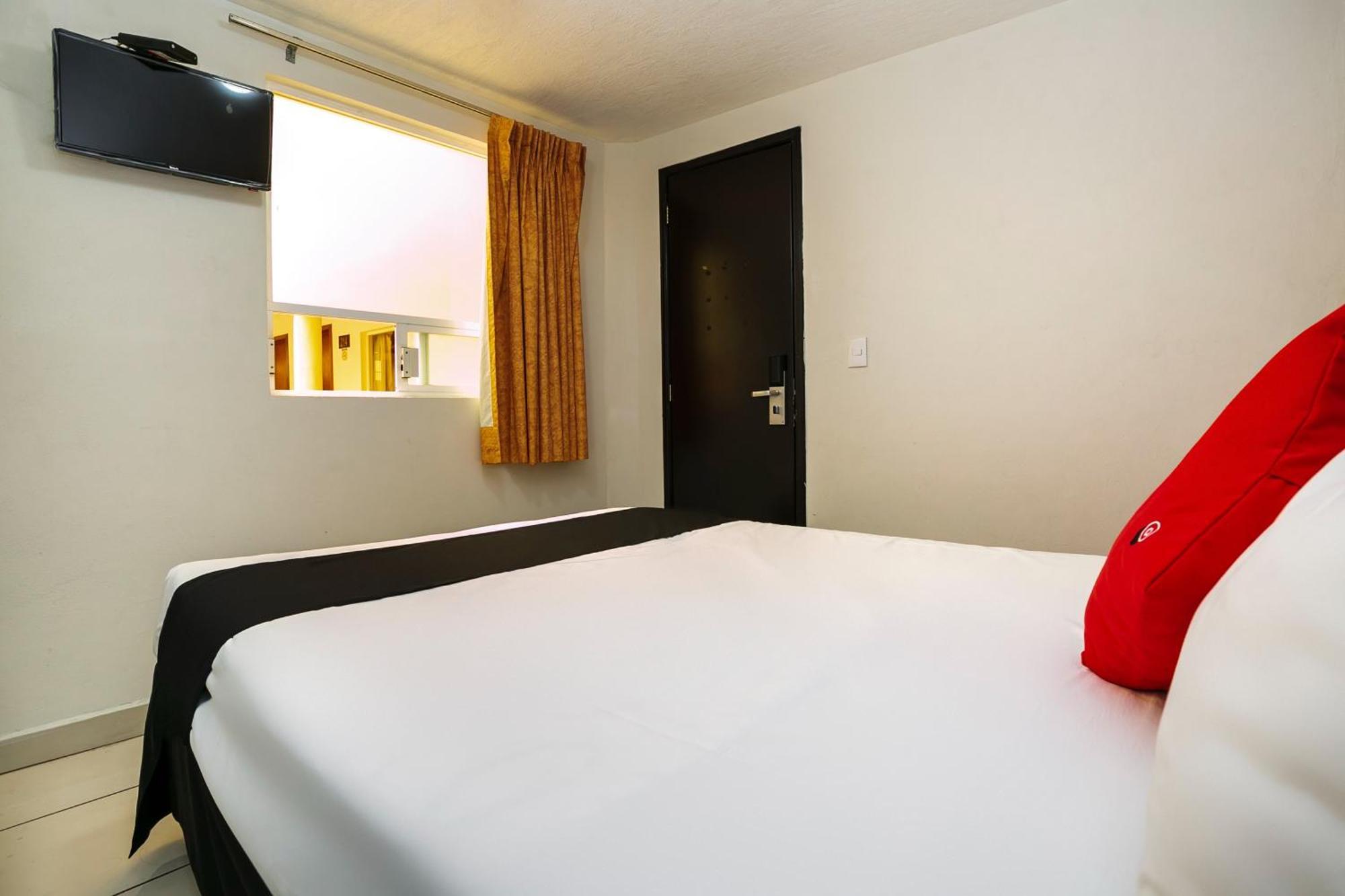 Capital O Hotel Victoria موروليا المظهر الخارجي الصورة