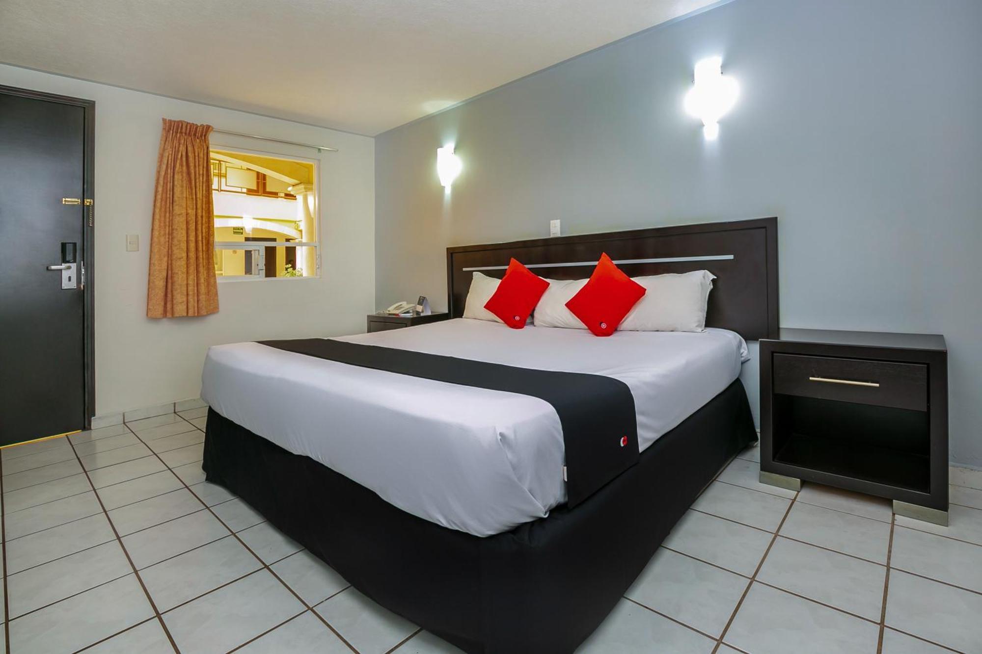 Capital O Hotel Victoria موروليا المظهر الخارجي الصورة