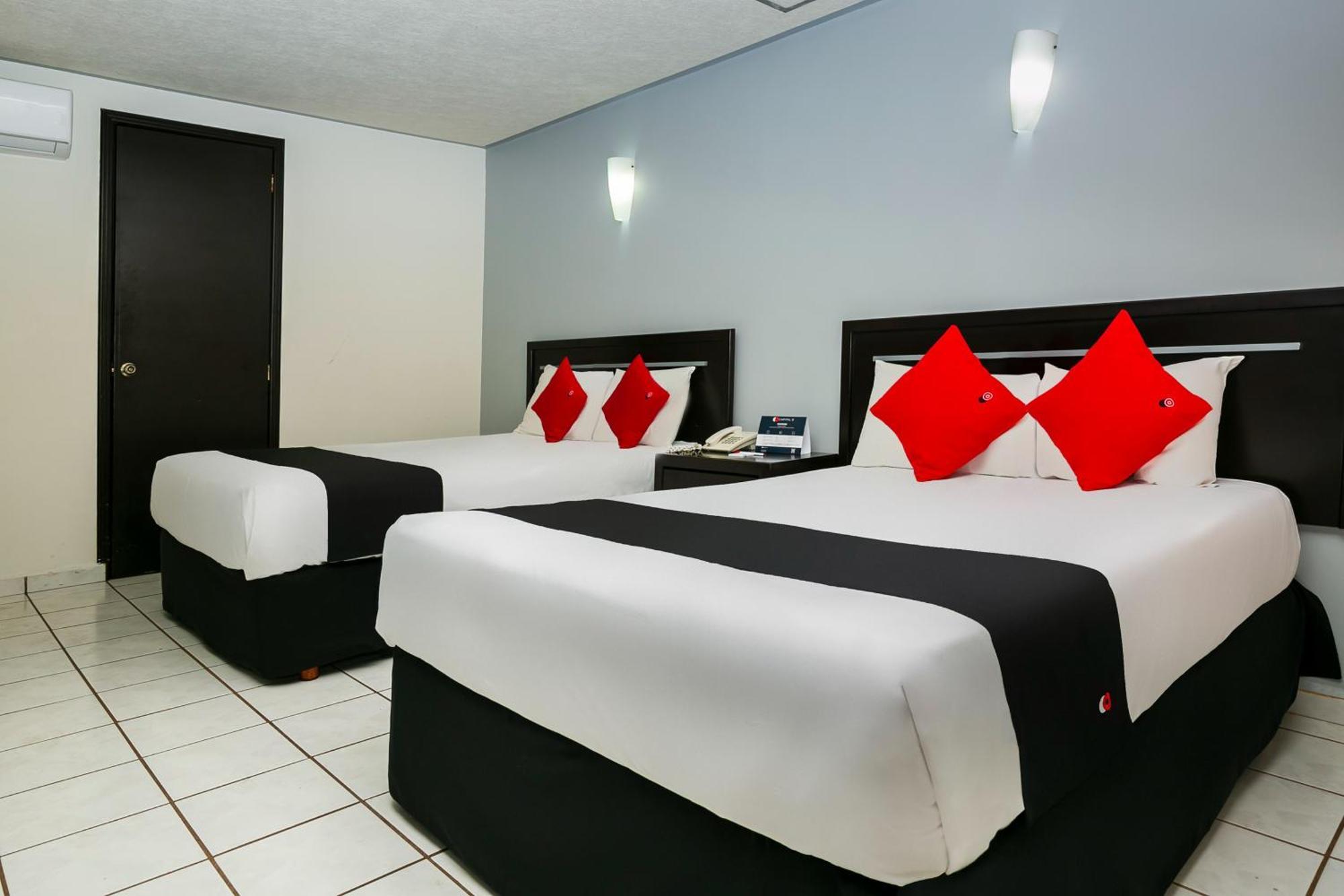 Capital O Hotel Victoria موروليا المظهر الخارجي الصورة