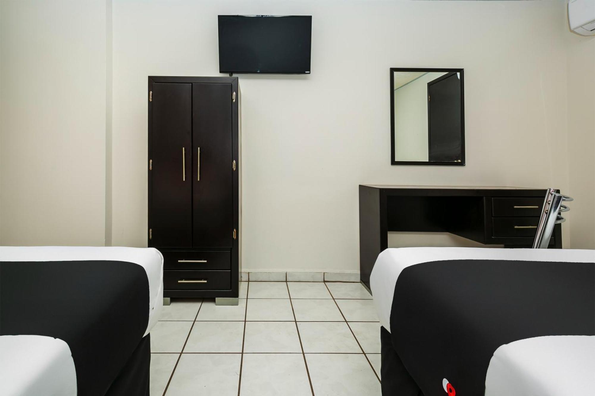 Capital O Hotel Victoria موروليا المظهر الخارجي الصورة